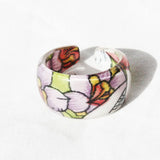 Floral acrylic Ring with floral design.