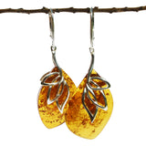 Intricate honey or cherry amber earrings