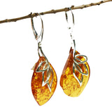 Intricate honey or cherry amber earrings