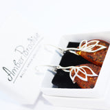Intricate honey or cherry amber earrings