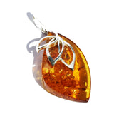 Intricate honey or cherry amber earrings