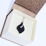 Pretty shaped honey or cherry coloured amber drop earrings