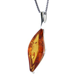 Striking and elegant Cognac Amber Pendant featuring silver and amber