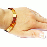 Baltic Amber Square Bracelets. One elastic strings expand to fit all wrists. Comes with lovely gift boxes. available in 5 colours