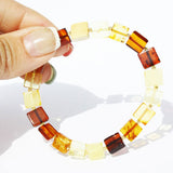 Baltic Amber Square Bracelets. One elastic strings expand to fit all wrists. Comes with lovely gift boxes. available in 5 colours