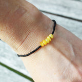 Minimalist Bracelet Amber and black glass beads