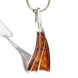 Eye-catching honey amber triangle pendant