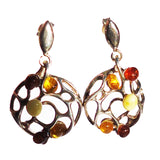 Romantic sterling silver 925 filigree fittings and small round honey and white baltic amber pieces used to make this stud earrings