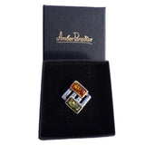 Modern sterling silver 925 square fittings and rectangular baltic amber pieces used to make this pendant.