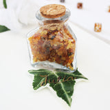 Little Glass Bottle Filled With Amber