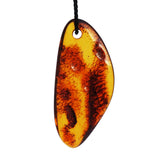 Honey or Grey Polished Baltic Amber Amulet