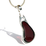 Individually crafted portions of baltic cherry amber drop earrings