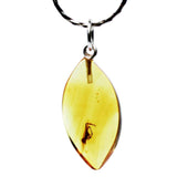 Capture The Warmth Of Amber With This Lemon Amber Pendant With Inclusion